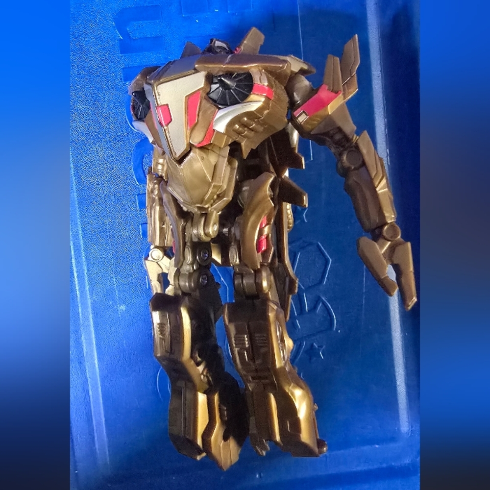 Gold and Red Robot Action Figure